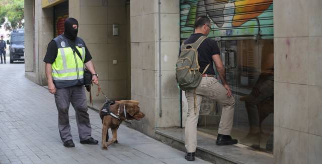 Police stage mass raids in Catalonia over alleged diversion of public funds