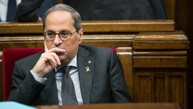 Torra, condenado a un año y medio de inhabilitación por negarse a retirar los lazos amarillos